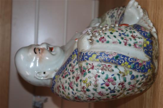 A Chinese famille rose figure of Budai and a Chinese pillow Budai 26cm